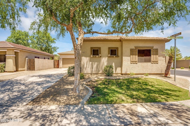 948 E Savannah Dr, Chandler, AZ 85225 - view of front facade featuring stucco siding, a tile roof, and driveway
