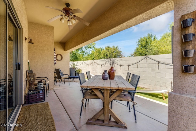 948 E Savannah Dr, Chandler, AZ 85225 - fenced backyard featuring a patio area, ceiling fan, and outdoor dining area