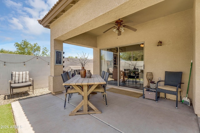 948 E Savannah Dr, Chandler, AZ 85225 - fenced backyard with a patio area, ceiling fan, and outdoor dining space