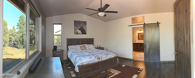 860 W Snow Creek Trl, Show Low, AZ 85901 - bedroom with a barn door, lofted ceiling, dark wood-style flooring, ensuite bathroom, and ceiling fan