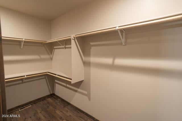 860 W Snow Creek Trl, Show Low, AZ 85901 - walk in closet featuring dark wood-style floors