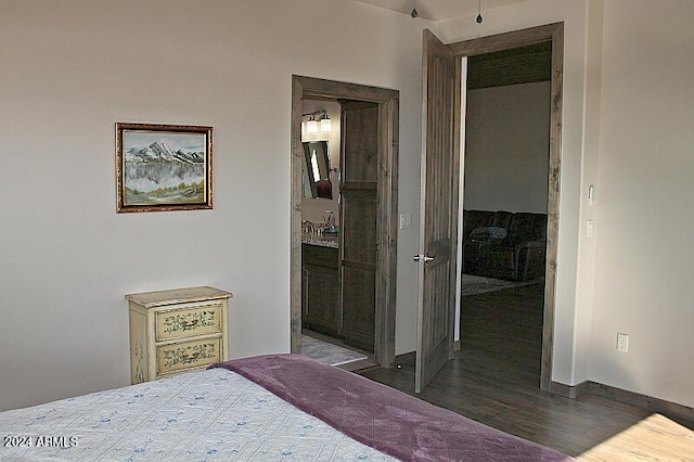 860 W Snow Creek Trl, Show Low, AZ 85901 - bedroom with wood finished floors, baseboards, and ensuite bathroom