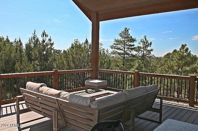 860 W Snow Creek Trl, Show Low, AZ 85901 - wooden terrace with an outdoor living space and a forest view