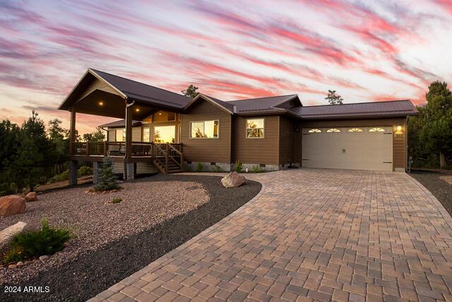 860 W Snow Creek Trl, Show Low, AZ 85901 - view of front facade featuring crawl space, decorative driveway, an attached garage, and stairs