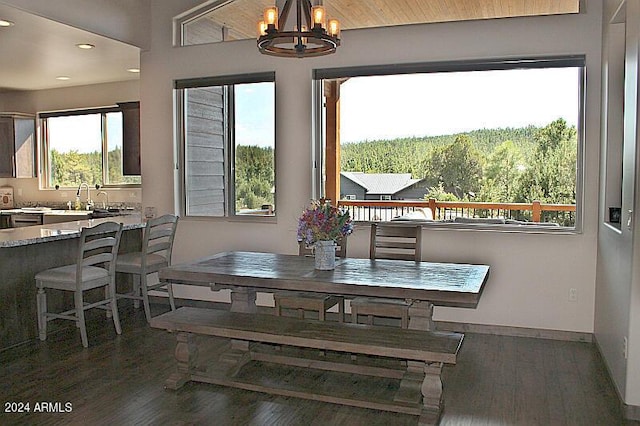 860 W Snow Creek Trl, Show Low, AZ 85901 - dining space featuring a chandelier, wood finished floors, recessed lighting, and baseboards