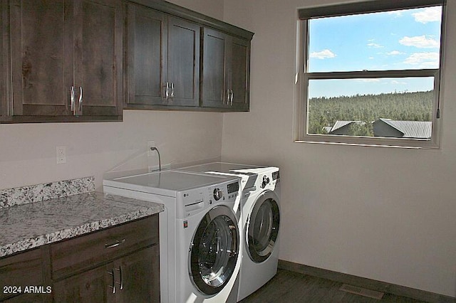860 W Snow Creek Trl, Show Low, AZ 85901 - washroom featuring cabinet space, washing machine and clothes dryer, baseboards, and dark wood finished floors