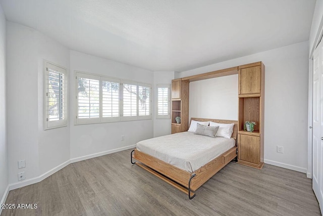 bedroom featuring light hardwood / wood-style floors