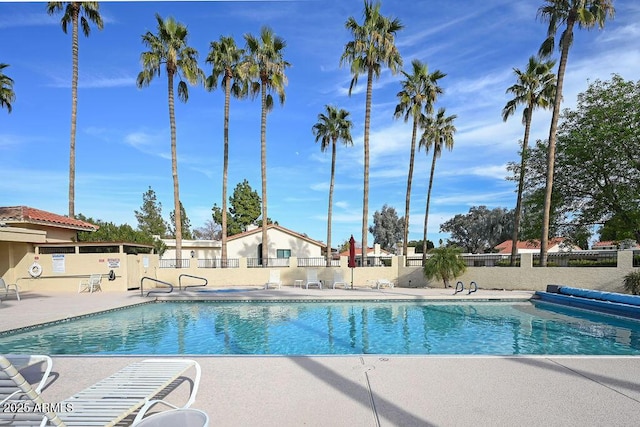 view of swimming pool featuring a patio