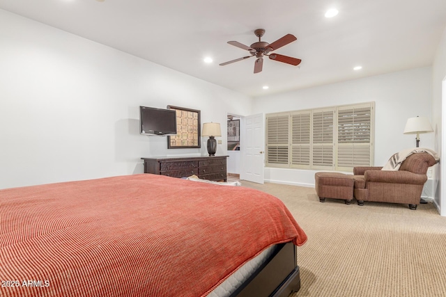 bedroom with light carpet and ceiling fan