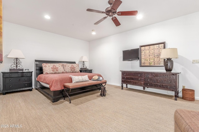 carpeted bedroom featuring ceiling fan