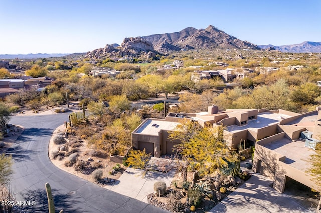 birds eye view of property featuring a mountain view