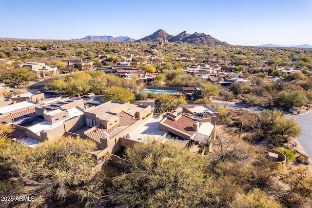 drone / aerial view featuring a mountain view