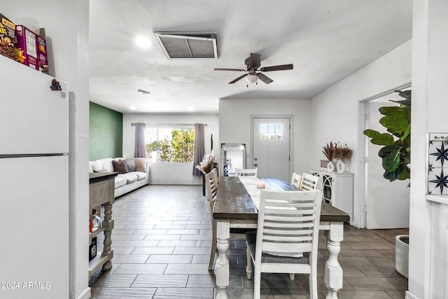 dining area with ceiling fan