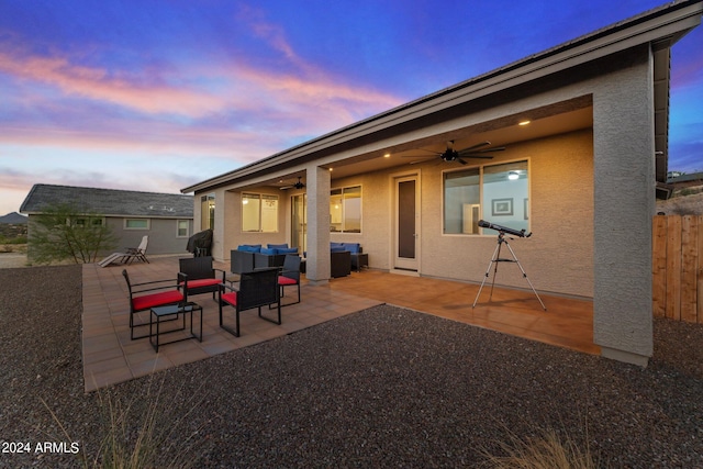 patio terrace at dusk with ceiling fan