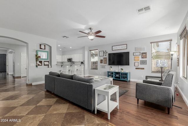 living room featuring ceiling fan