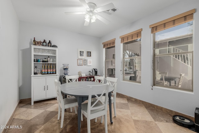 dining area with ceiling fan