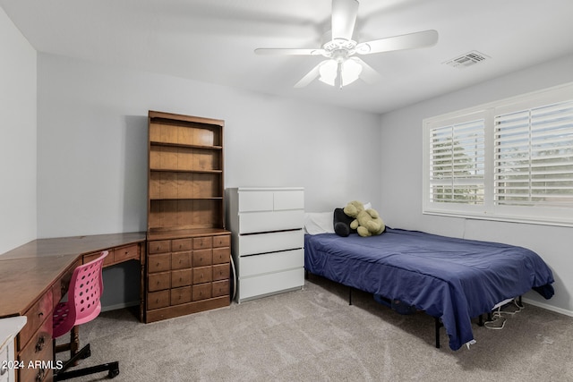 bedroom featuring ceiling fan and light colored carpet