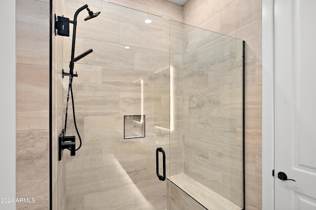 full bathroom featuring a shower stall