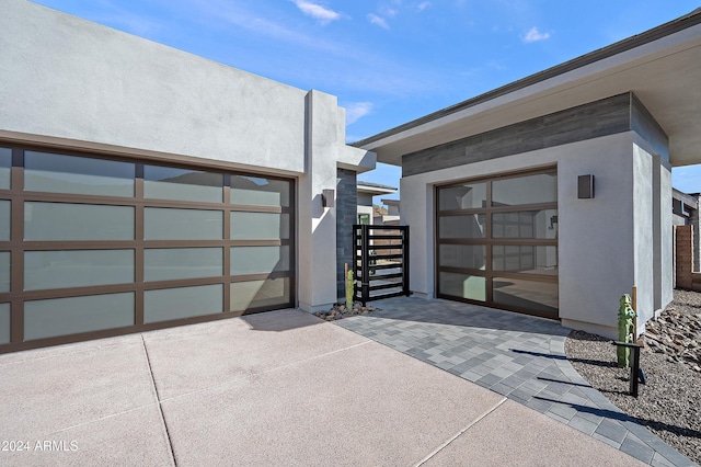 garage featuring driveway