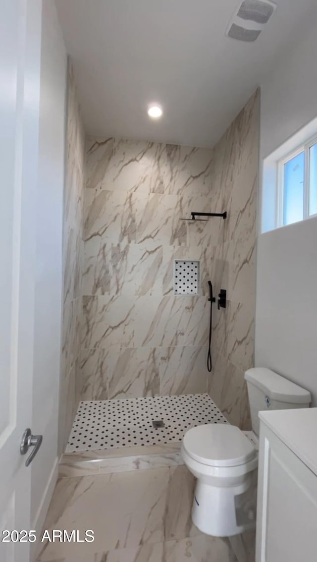 full bath with recessed lighting, vanity, toilet, a marble finish shower, and visible vents