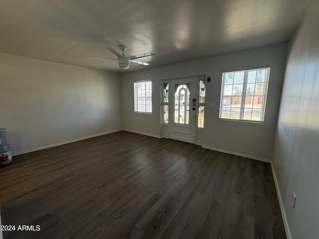 entrance foyer with dark wood-type flooring and ceiling fan