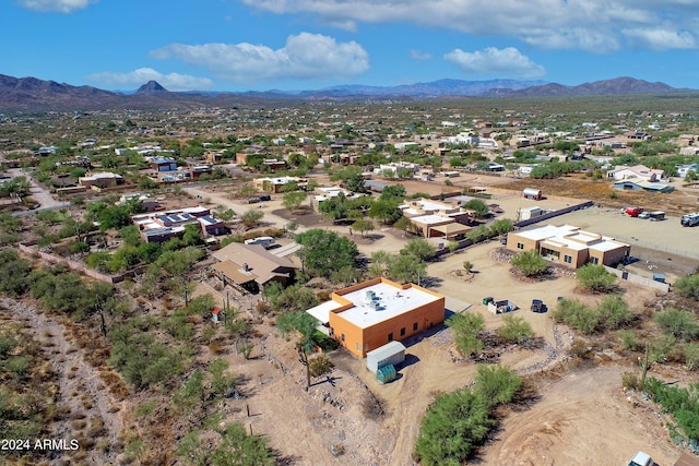 drone / aerial view featuring a mountain view