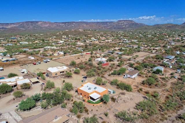 drone / aerial view featuring a mountain view