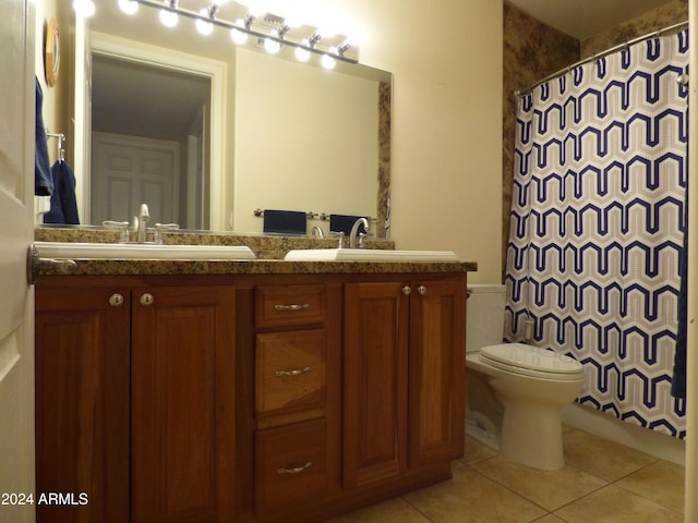 bathroom featuring a shower with curtain, tile patterned flooring, vanity, and toilet