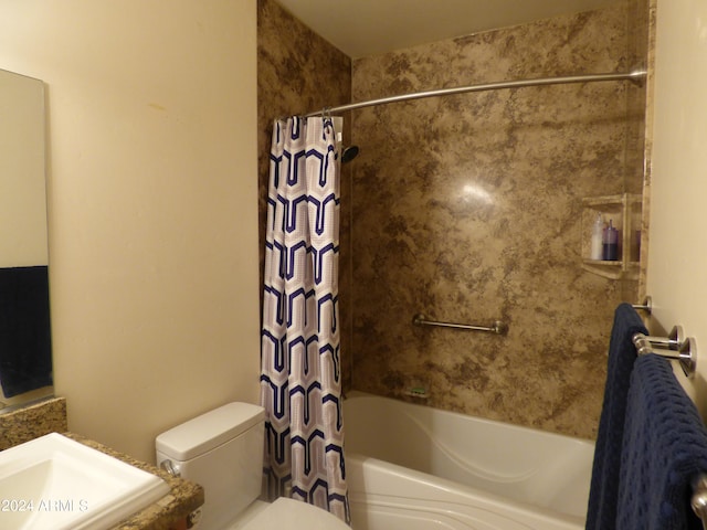 full bathroom featuring shower / bath combination with curtain, toilet, and vanity