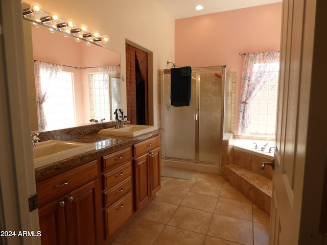 bathroom featuring vanity, separate shower and tub, and tile patterned floors