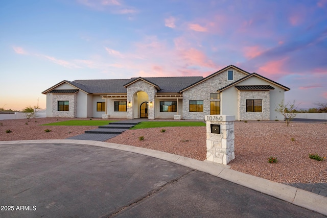 10760 W Golddust Dr, Queen Creek, AZ 85144 - view of front facade featuring stucco siding and stone siding
