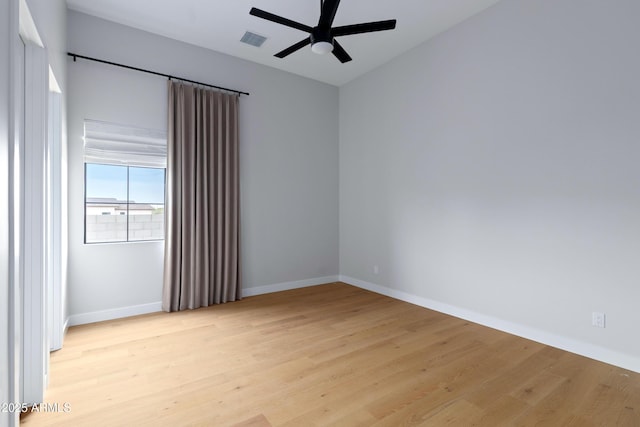 10760 W Golddust Dr, Queen Creek, AZ 85144 - spare room featuring baseboards, ceiling fan, visible vents, and light wood-style floors