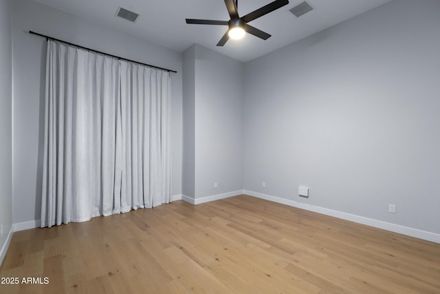 10760 W Golddust Dr, Queen Creek, AZ 85144 - unfurnished room with baseboards, visible vents, light wood-style flooring, and ceiling fan