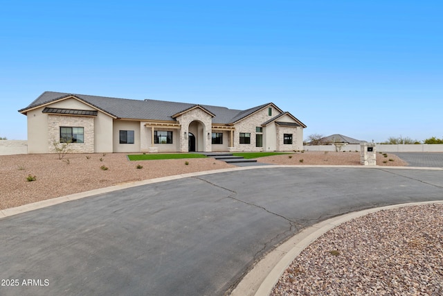10760 W Golddust Dr, Queen Creek, AZ 85144 - view of front of property with brick siding and stucco siding