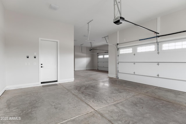 10760 W Golddust Dr, Queen Creek, AZ 85144 - garage with a garage door opener and baseboards