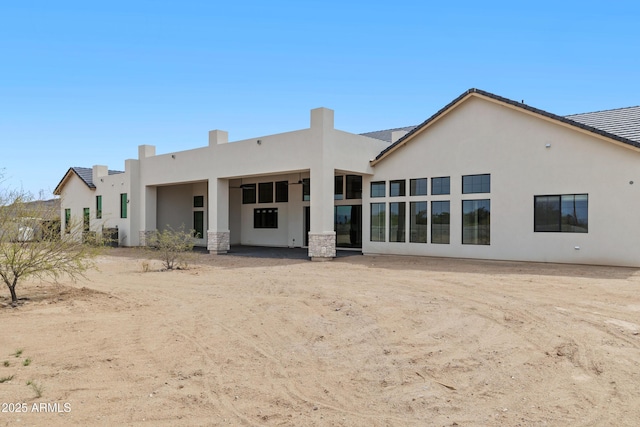 10760 W Golddust Dr, Queen Creek, AZ 85144 - back of house with a tile roof and stucco siding