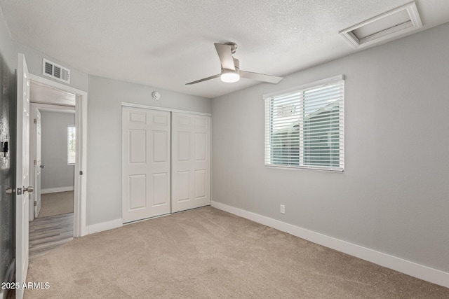 13202 N 40th Pl, Phoenix, AZ 85032 - unfurnished bedroom featuring attic access, carpet, a closet, a textured ceiling, and baseboards