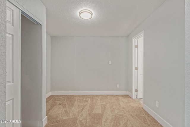 13202 N 40th Pl, Phoenix, AZ 85032 - empty room with light colored carpet, a textured ceiling, and baseboards