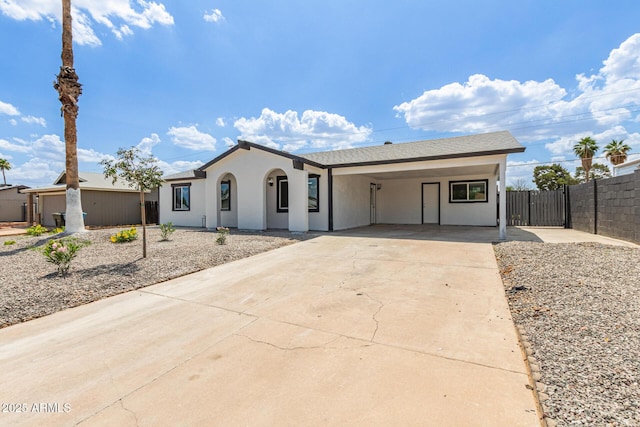 13202 N 40th Pl, Phoenix, AZ 85032 - ranch-style home with concrete driveway, stucco siding, and an attached carport