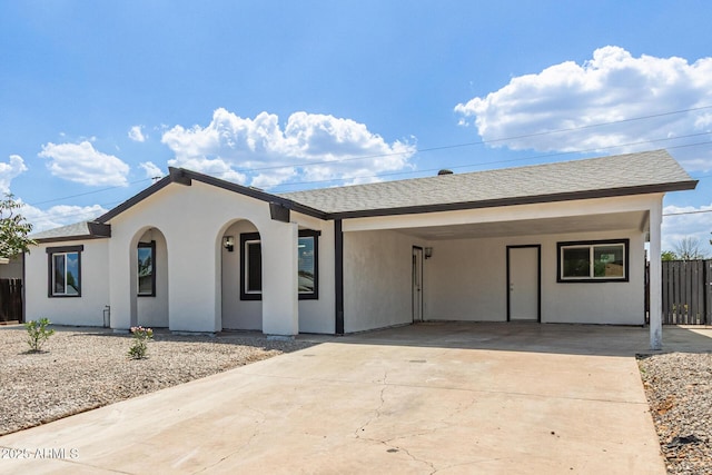 13202 N 40th Pl, Phoenix, AZ 85032 - single story home with driveway, stucco siding, a carport, and roof with shingles