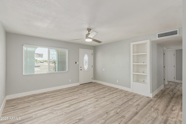 13202 N 40th Pl, Phoenix, AZ 85032 - foyer entrance with ceiling fan, light wood-style flooring, and baseboards
