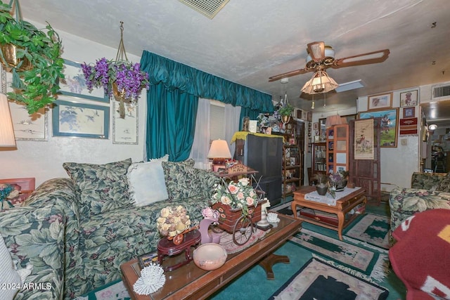 living room featuring ceiling fan