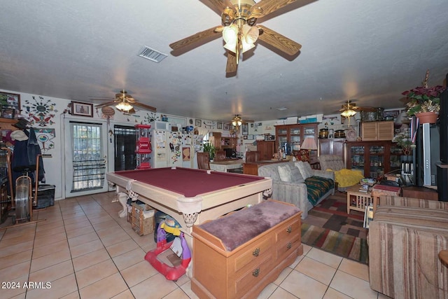 playroom with ceiling fan, pool table, and light tile patterned floors