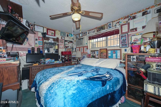 bedroom with ceiling fan, a textured ceiling, and carpet