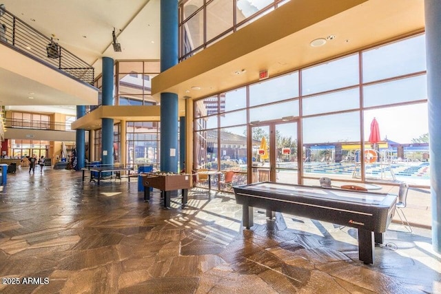 building lobby featuring a towering ceiling