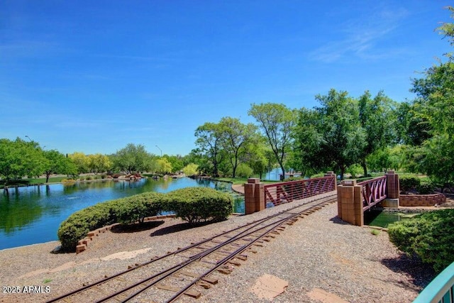 view of home's community featuring a water view