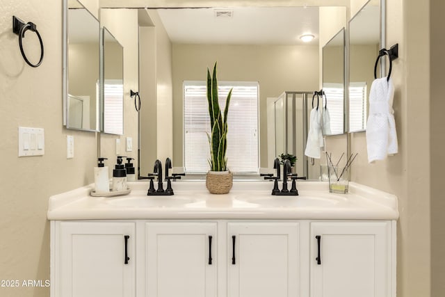 bathroom with double vanity