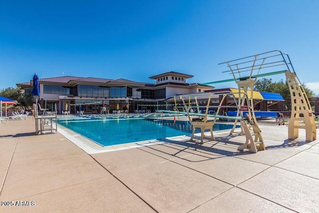 community pool featuring a patio