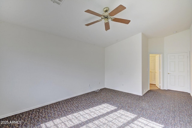 unfurnished room featuring ceiling fan and carpet floors