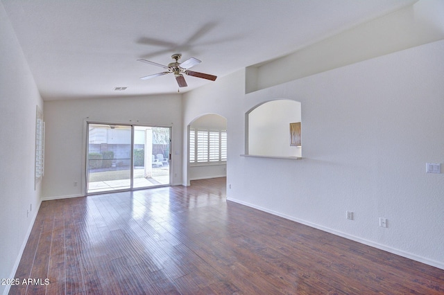 unfurnished room with ceiling fan and dark wood-type flooring